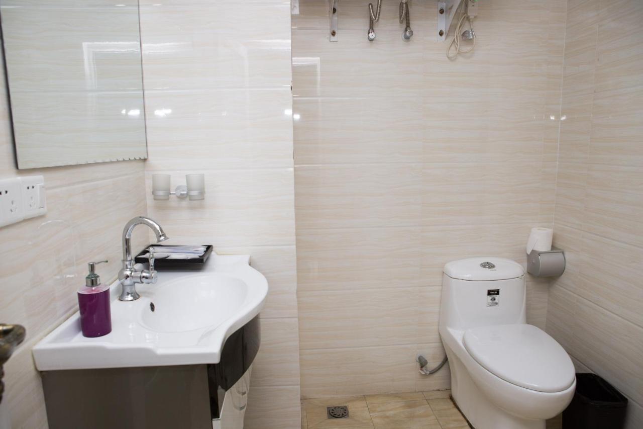 WAIFIDEN Guangzhou HaiZhu Square WanYi Apartment Extérieur photo
